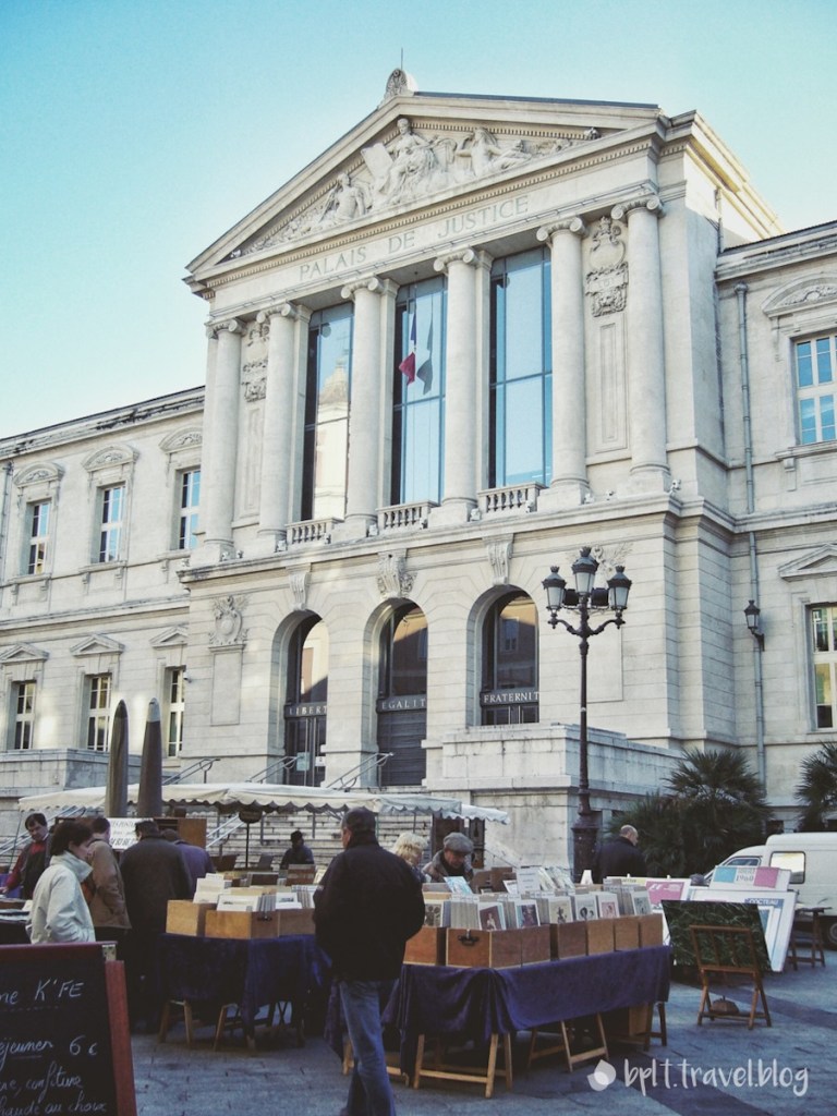 A flea market in front of Palais de Justice, Nice.